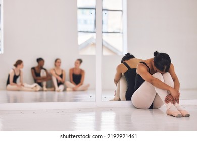 Bullying, stress or sad ballerina in training with ballet dancers, artists or professional studio performers. Upset, unhappy or anxious girl with bad mental health from bullying in theater rehearsal - Powered by Shutterstock