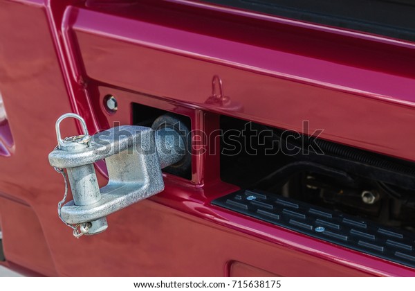 bumper\
trucks and tow hook for towing. focus on the\
hook