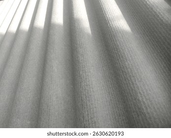 Bumpy asbestos surface. Repeated up and down patterns