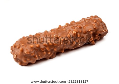 Bumpy chocolate bar on a white background. Chocolate with nuts close-up.
