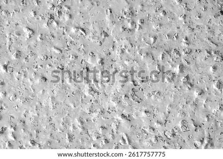 A bumpy white wall texture background