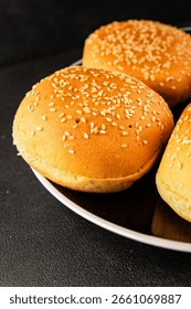Bun burger puffy soft buns baking fresh delicious gourmet food background on the table rustic food top view copy space