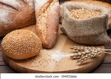 bun wheat flour on wooden background. food concept - Shutterstock ID 594923666