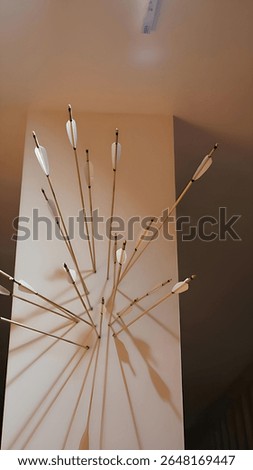 Bunch of arrows in the wall