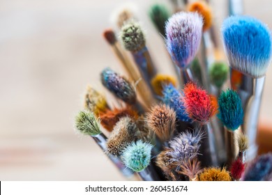 Bunch of artist paintbrushes closeup, selective focus. - Powered by Shutterstock