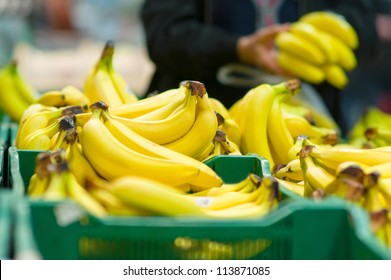 Bunch Of Bananas In Boxes In Supermarket