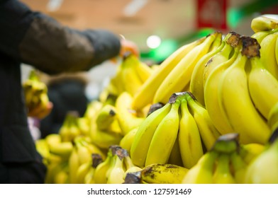 Bunch Of Bananas On Boxes In Supermarket