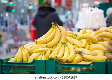 Bunch Of Bananas On Boxes In Supermarket