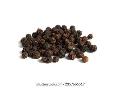 A bunch of black peppers with polka dots lie on a black background.