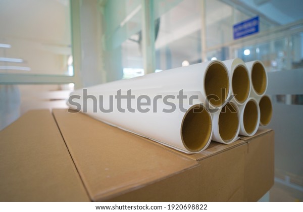 A bunch of brown\
industrial paper core isolated on white background with shadow\
reflection. A lot of paper cores or paper tubes on white backdrop.\
Brown paper rolls. 
