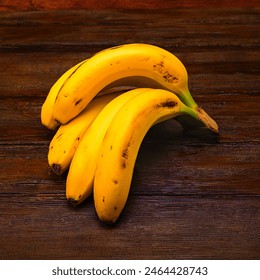 Bunch of Canarian bananas on a wooden board - Powered by Shutterstock