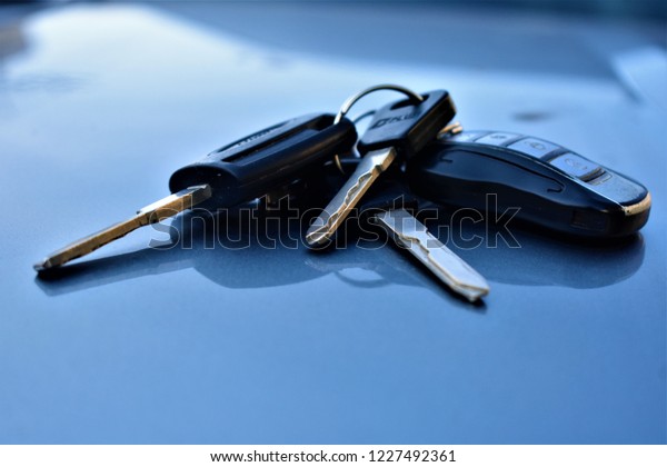 bunch of car keys on car\
boot