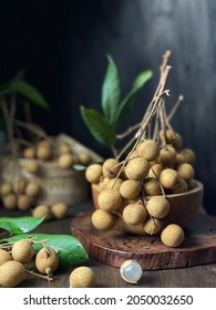 A bunch of Cat's Eye Fruit or Buah Mata Kucing in under exposed - Shutterstock ID 2050032650