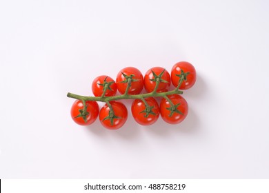 Bunch Of Cherry Tomatoes On White Background