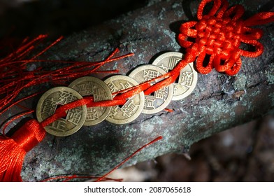 A Bunch Of Chinese Coins That Attract Good Luck And Wealth. Hieroglyphs Mean Attracting Good Luck And Financial Well-being.