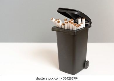 Bunch Of Cigarettes In The Trash Bin. Quit Smoking Concept