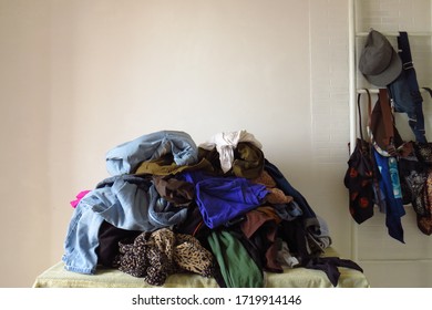 A Bunch Of Clothes, A Mess Of Things, The Concept Of Cleaning Up The House. Discard And Recycle Unnecessary Clothing.