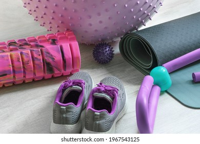 Bunch Of Colorful Fitness Accessories, Equipment For Physical Workout At Home. Exercise Mat, Sneakers, Massage Roller And Ball, Fitball. Active Healthy Lifestyle Concept.