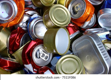 A bunch of crushed aluminum cans all together for recycling to help be green for the Earth and to be environmentally friendly