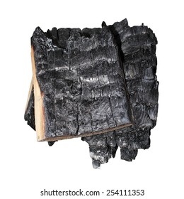 Bunch Of Dark Burnt Wood Isolated Over White Background