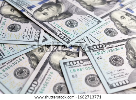 a bunch of dollar bills close up