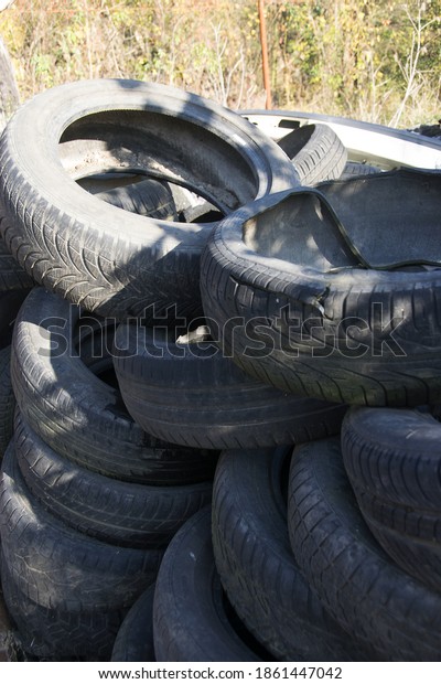 A bunch of dump tires from used cars.
Environmental pollution. Old
tires.