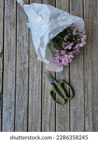 a bunch of flower and a scissors
