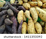 a bunch of fresh sweet potatoes