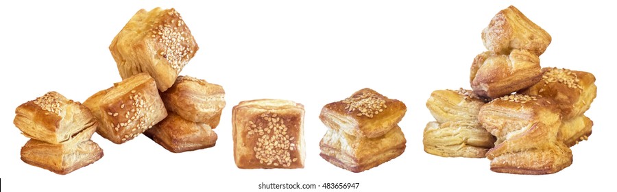 Bunch Of Freshly Baked Small Square Sesame Puff Pastry Zu-Zu Isolated On White Background