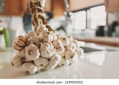 Bunch of garlic on the kitchen table. Concept of prepare cooking.
