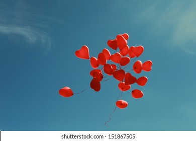 Bunch Of Heart Shaped Balloons In Blue Sky