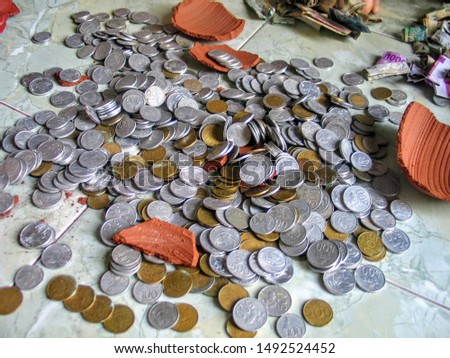 A bunch of Indonesian money coins (celengan pecah)