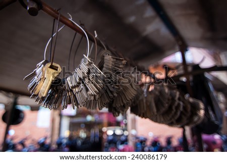 A Bunch of key hanging on the wire from a key maker shop in Vietnam