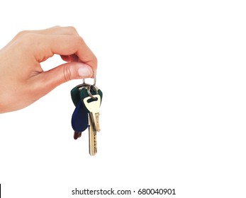 A Bunch Of Keys In Hand On A White Background. Isolated.