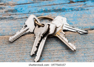 A Bunch Of Keys Lying On A Bench. Don't Get Home. High Quality Photo