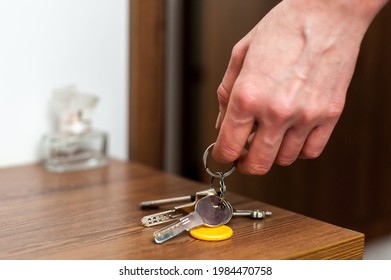 a bunch of keys on the bedside table