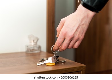 a bunch of keys on the bedside table