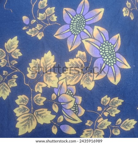 Bunch of leaves and flowers on blue background 