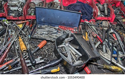 Bunch Of Messy Hand Tools In An Auto Mechanic Garage