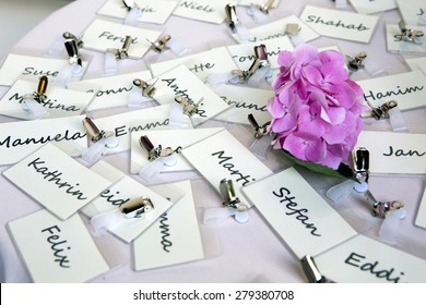 Bunch Of Nametags Scattered On A Table