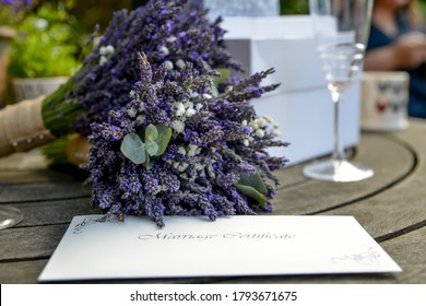 Bunch On Lavender On A Wooden Table At A Wedding. 