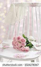 Bunch Of Pink Roses Lying On Shabby Chic Style Wooden Chair Decorated With Decoupage Technique 