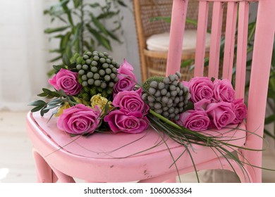 Bunch Of Pink Roses Lying On Pink Shabby Chic Style Wooden Chair Decorated With Decoupage Technique. Beautiful Flowers For A Romantic Evening, Close Up