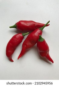 Bunch of red pepper in white surface