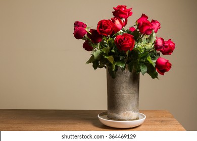 Bunch Of Red Rose In Baked Clay Vase