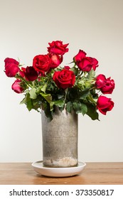 Bunch Of Red Rose In Baked Clay Vase