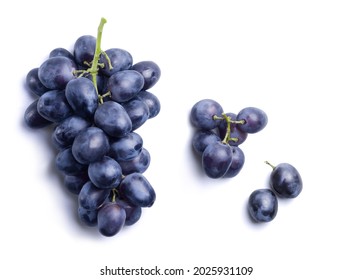 Bunch of ripe dark blue grapes isolated on white background. View from above. - Shutterstock ID 2025931109