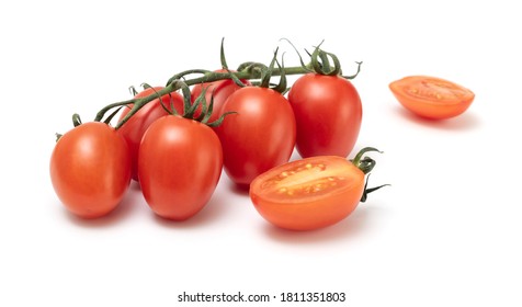 A bunch of ripe fresh Roma plum tomato isolated on white backround. Solanum lycopersicum popularly used both for canning and producing tomato paste because of its slender and firm nature.