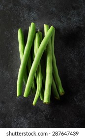 Bunch Of Trimmed Fine Green Beans Shot From Above On Dark Background