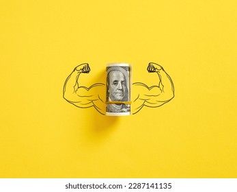 Bunch of United States dollar money with flexing muscle biceps on yellow background. Strong or highest currency concept.